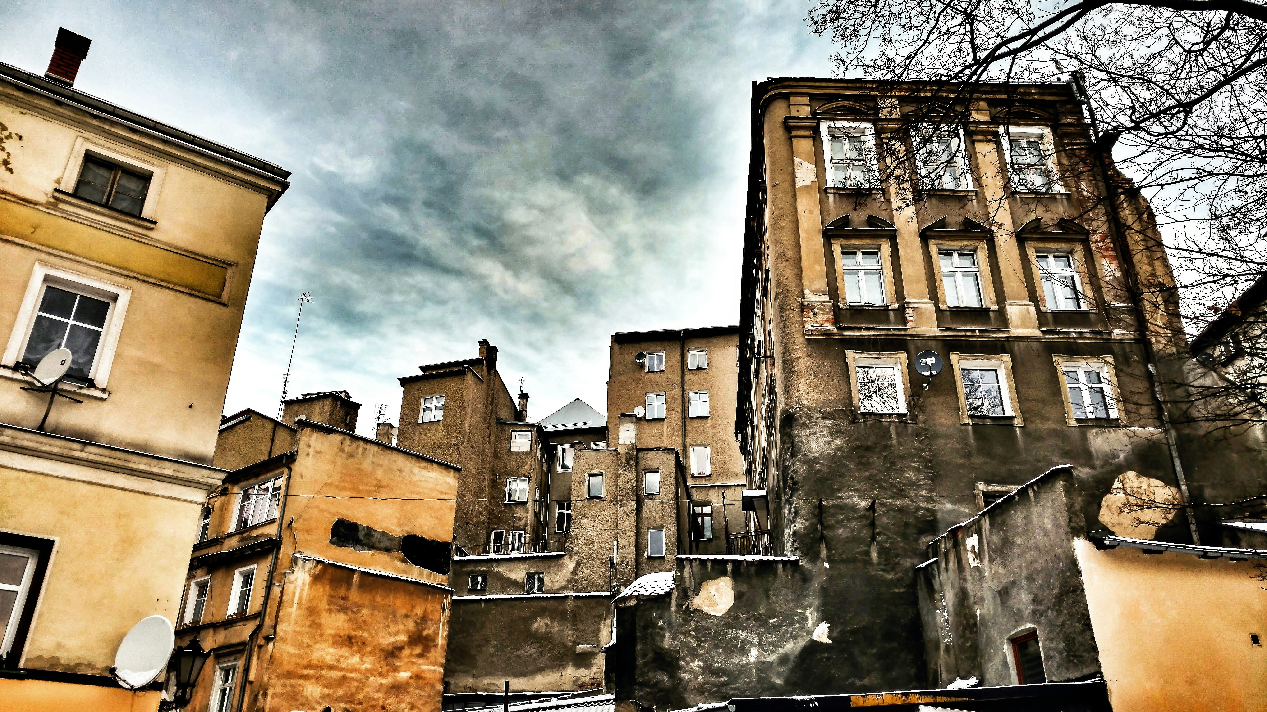 photography of brown concrete high-rise buildings